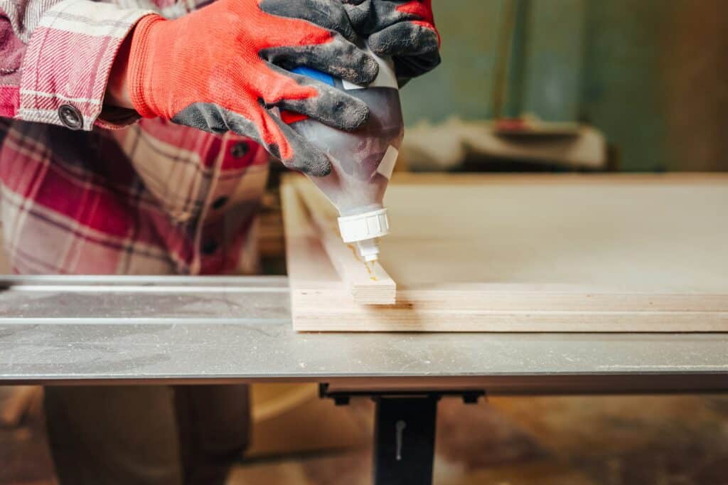 Process of gluing plank of plywood